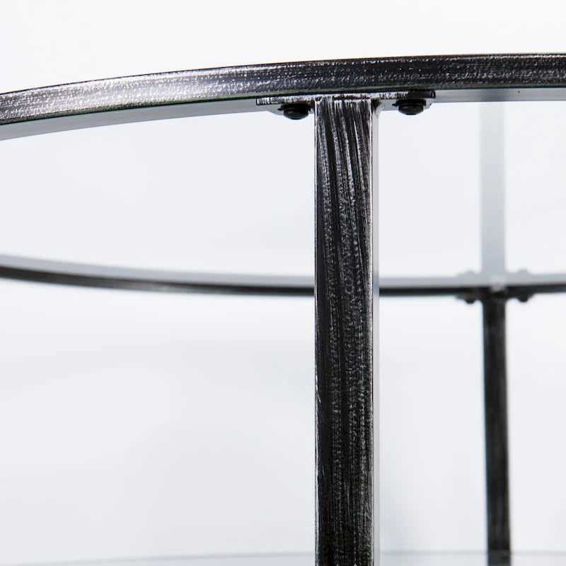 Table basse ronde en métal noir vieilli avec plateau en verre et étagère
