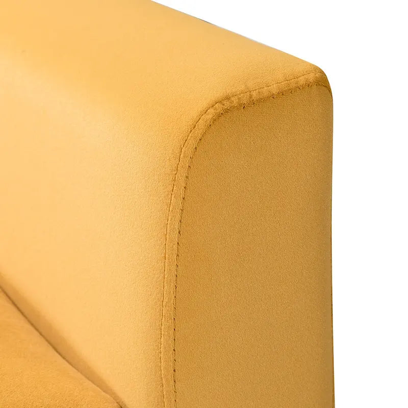 Fauteuil contemporain en velours capitonné avec pieds en métal doré par